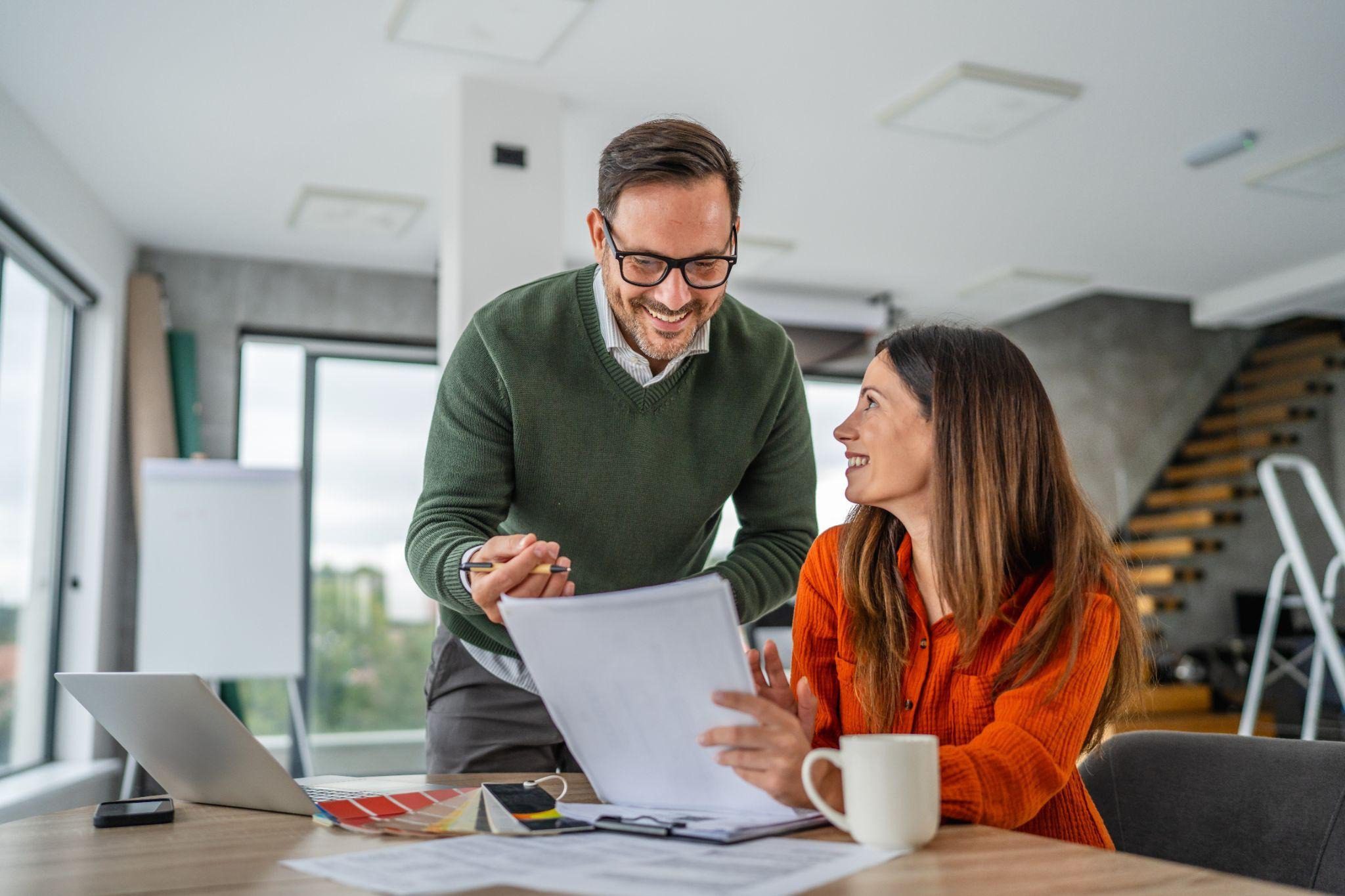two people looking at financing options